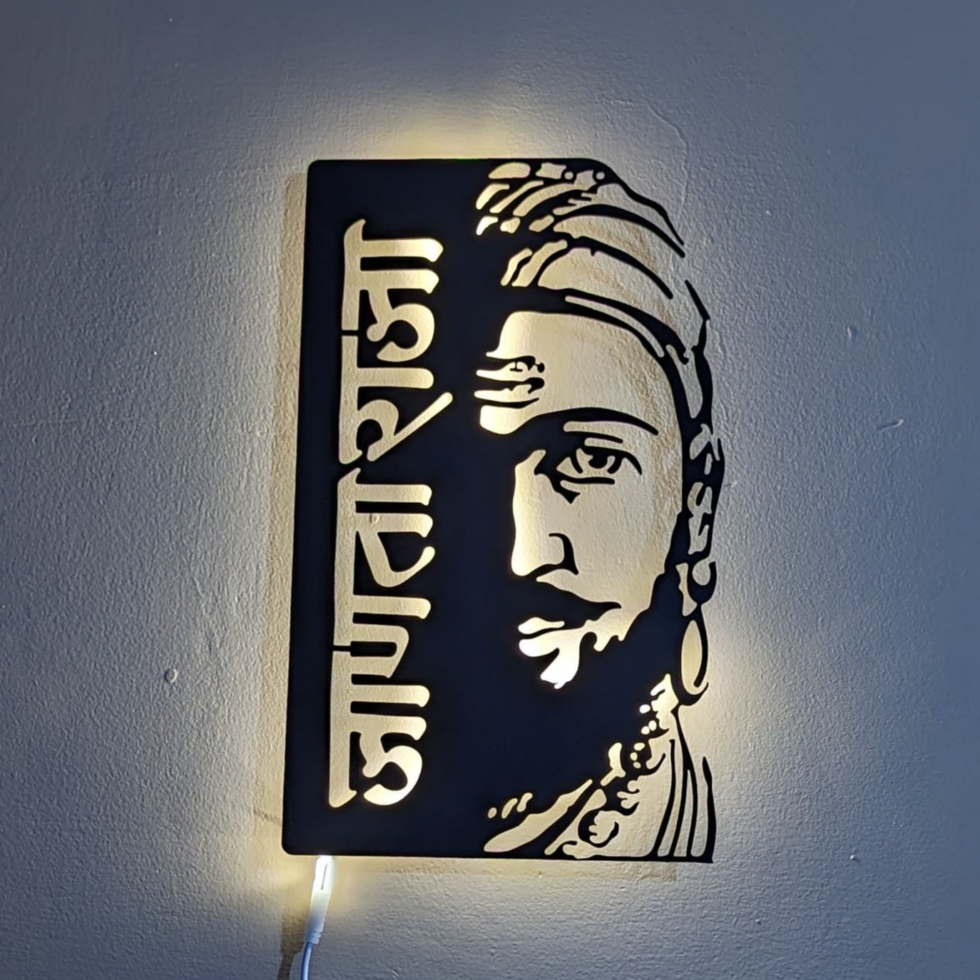 Janta Raja Steel Wall Art Sculpture in Black with LED Light