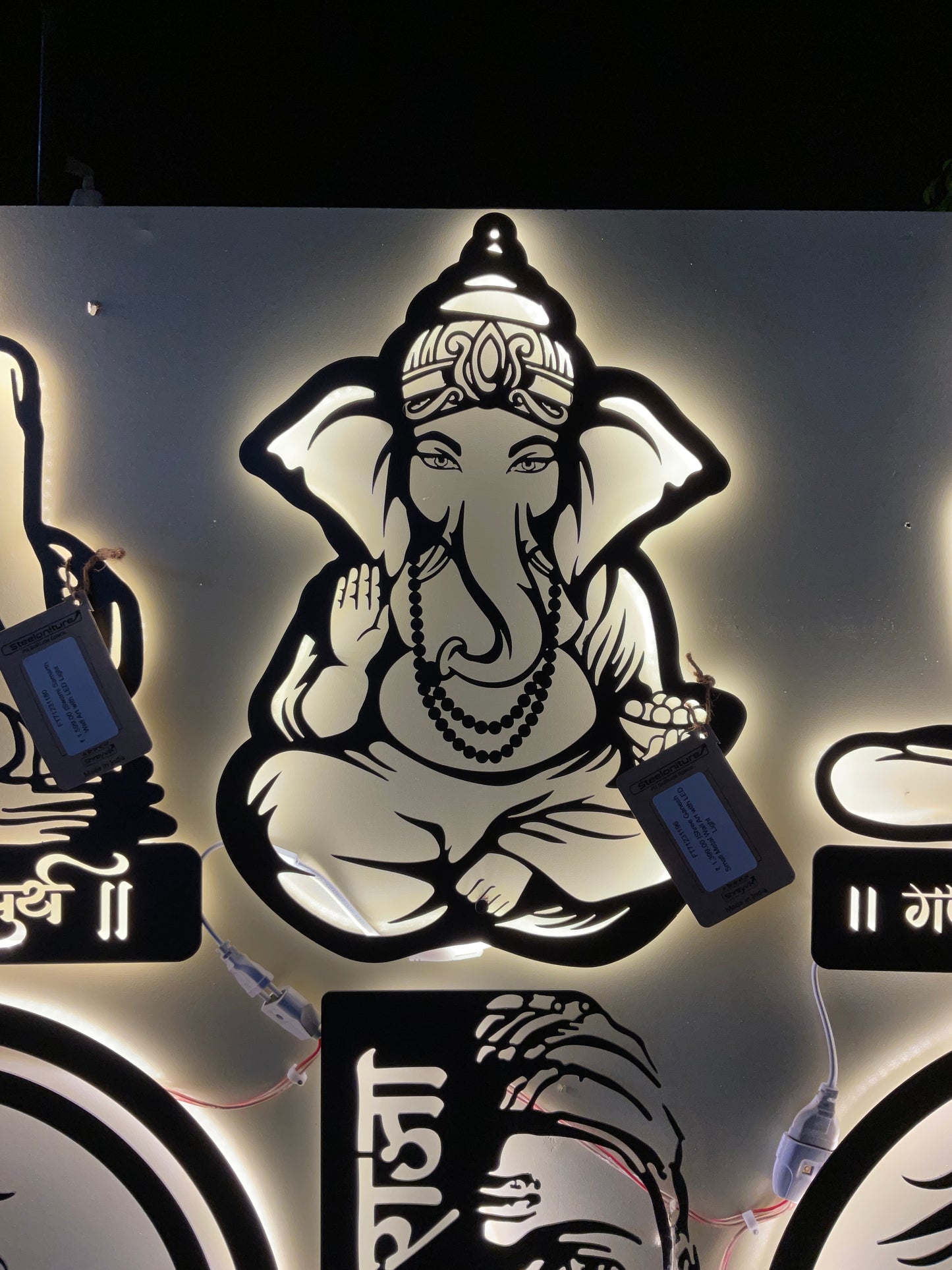 Shree Ganesh CNC Steel Wall Art Sculpture in Black with LED Light